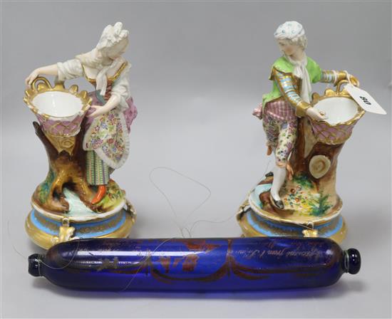 A pair of Paris porcelain figural bowls and a rolling pin